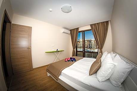 One-Bedroom Apartment with Side Sea View (2 Adults + 2 Children)