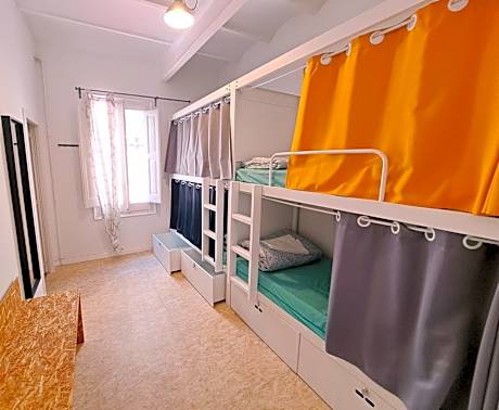 Bed in 4-Bed Female Dormitory Room with Shared Bathroom
