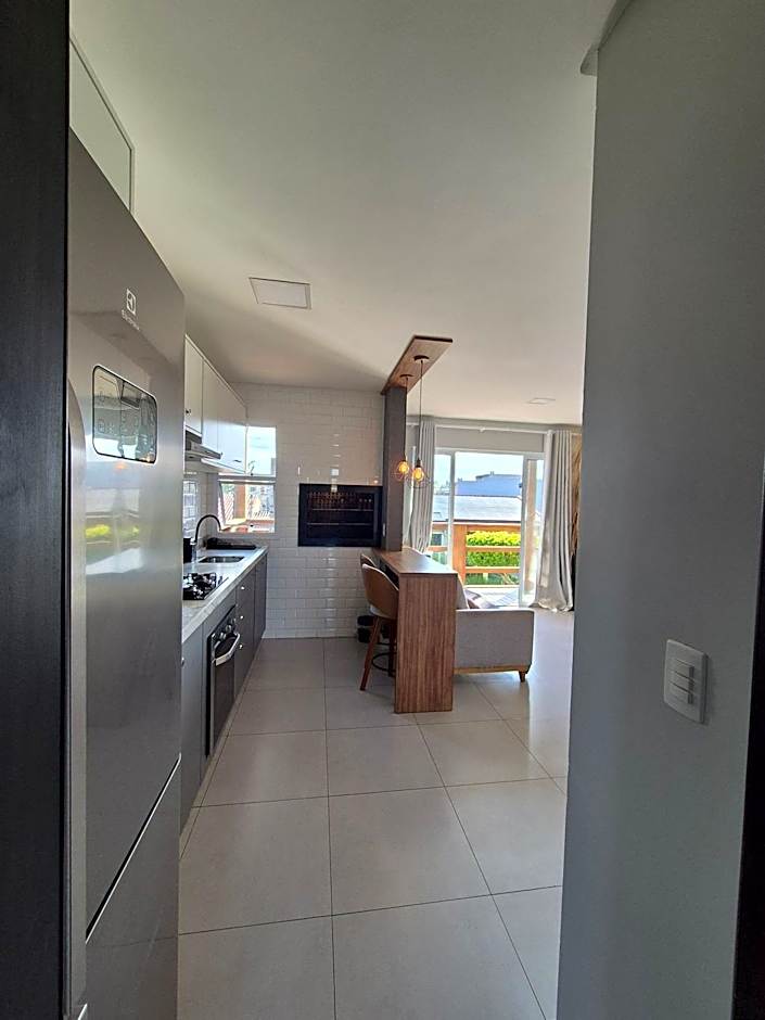 Casa no segundo andar na Praia da Cal com ar e sacada