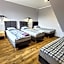 Wrzosowe Wzgórze 5 - Studia i Apartamenty