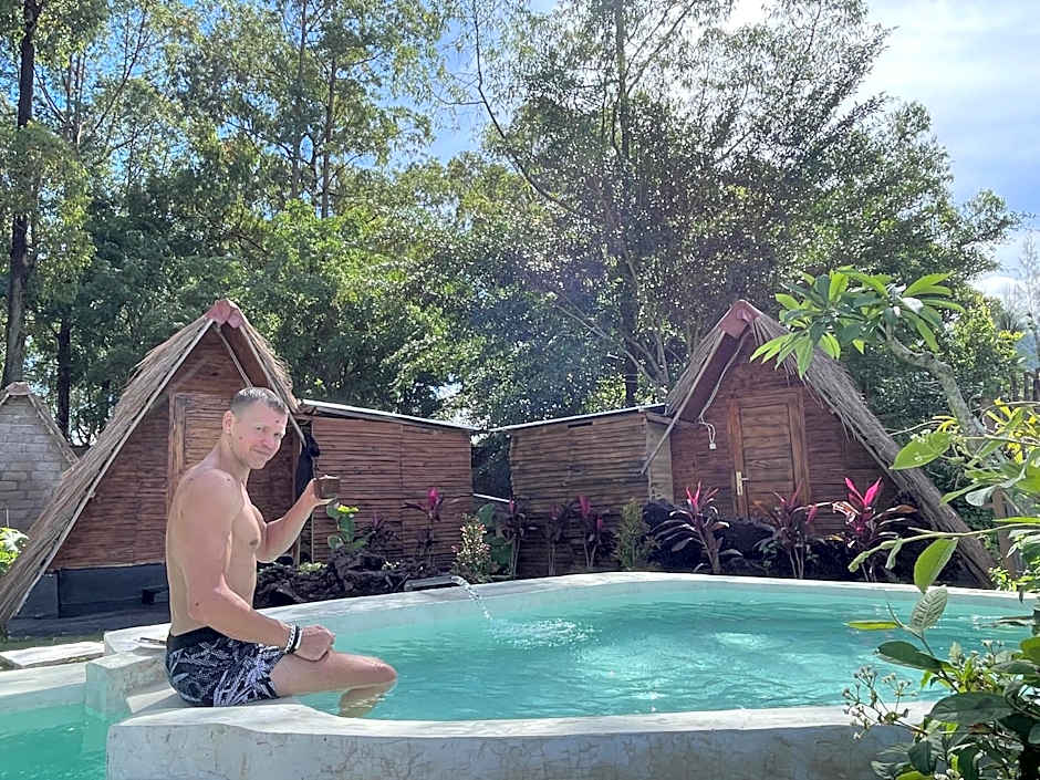 Triangular house and hot spring