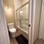 A cozy bedroom with a private washroom close to YVR Richmond