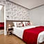 Essence Inn Marianos Hotel