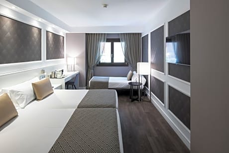 Triple Room (2 Adults + 1 Child)