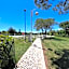 Casa Antia, nuovo bilocale con giardino in Residence con piscina