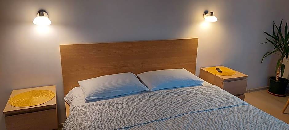 Apartamentai šalia baseino