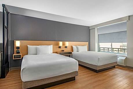 Queen Room with Two Queen Beds and Sofa Bed
