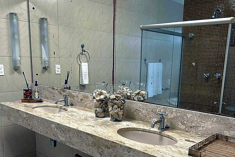 Casa Ilha| beira mar, piscina aquecida, 4 suítes