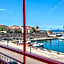 ClickSardinia Alghero Spectacular waterfront Neptune apartment with sea-facing terraces and garden