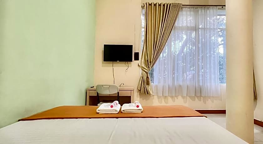 Wisma Anggrek Syariah Mitra Reddoorz