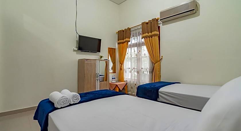 The Lima Guest House Syariah Mitra RedDoorz