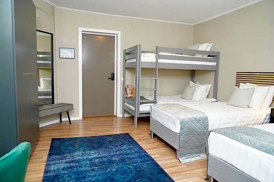 Foto 1 av 6 av Quadruple Room