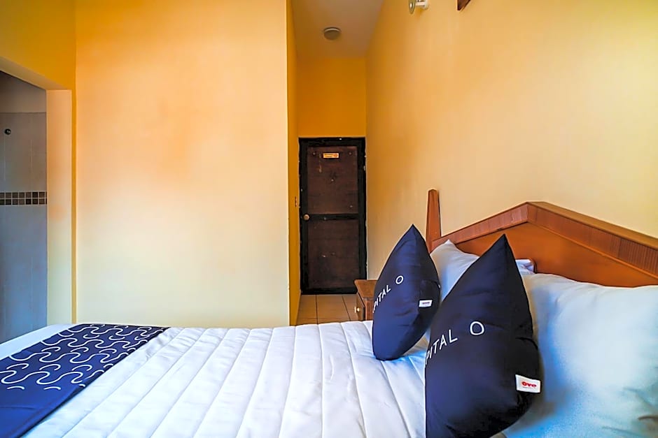 Capital O Hotel Aurora