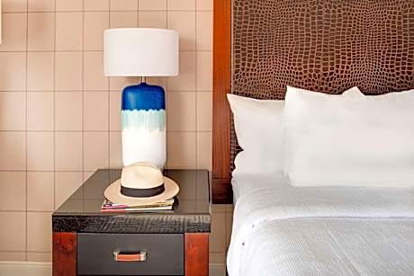 King Room with Mobility Accessible Tub and Sofa Bed