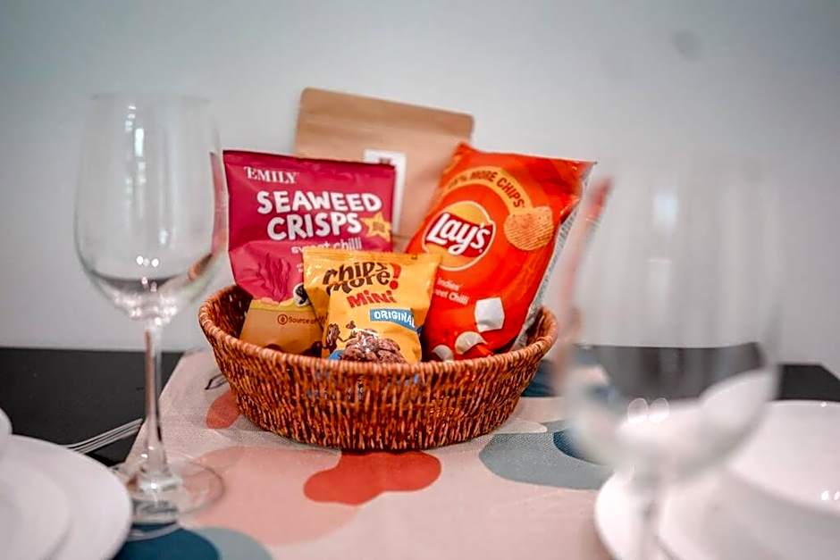 Cozy 1BR apartment by beach - partial ocean view