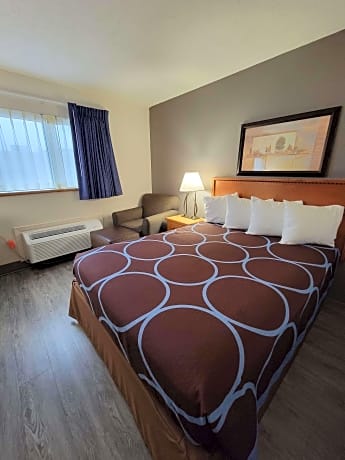 1 queen bed, non-smoking, work desk, chair with ottoman, microwave and mini-refrigerator, continental breakfast
