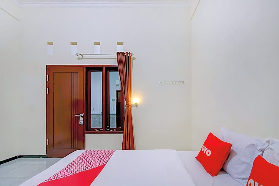 Capital O 90151 Guest House 180