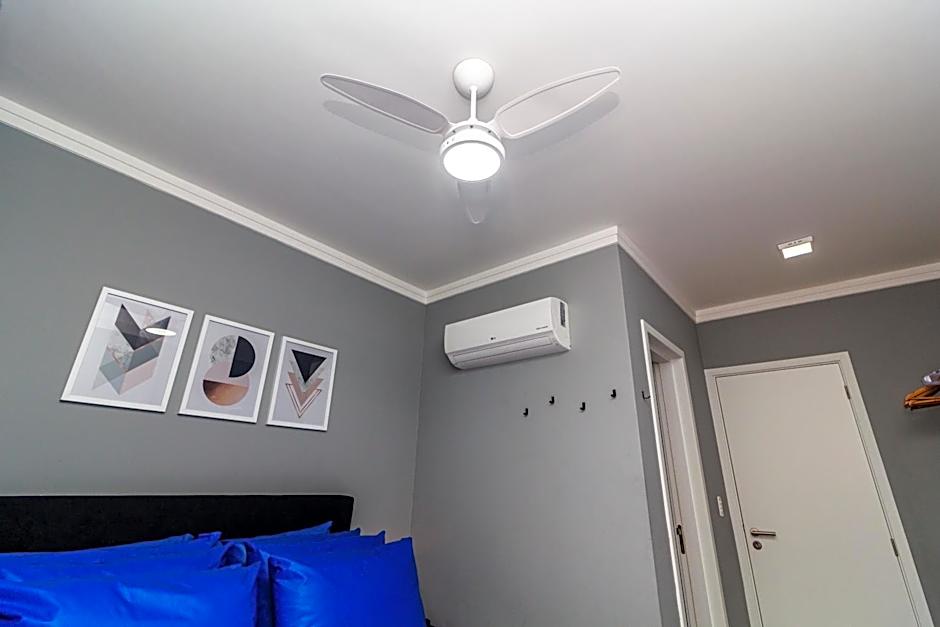 Piemax Praia Grande - 100m PRAIA do BOQUEIRÃO e CENTRO - Vista MAR - Varanda GOURMET com CHURRASQUEIRA privativa - AR CONDICIONADO em todos os ambientes - Wi-Fi 600 Mbps - HOME OFFICE- Vaga de Garagem - Acomoda até 6 pessoas