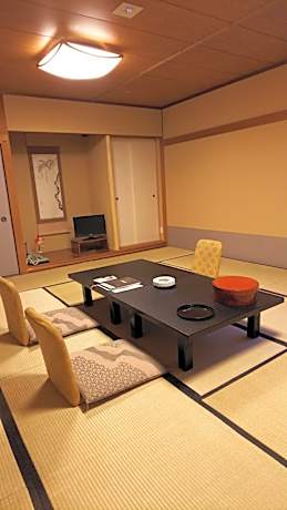 Japanese-Style Room with Semi Open-Air Bath and Small Garden