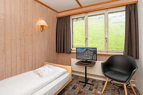 Basic Plus Single Room with Shared Shower and Toilet