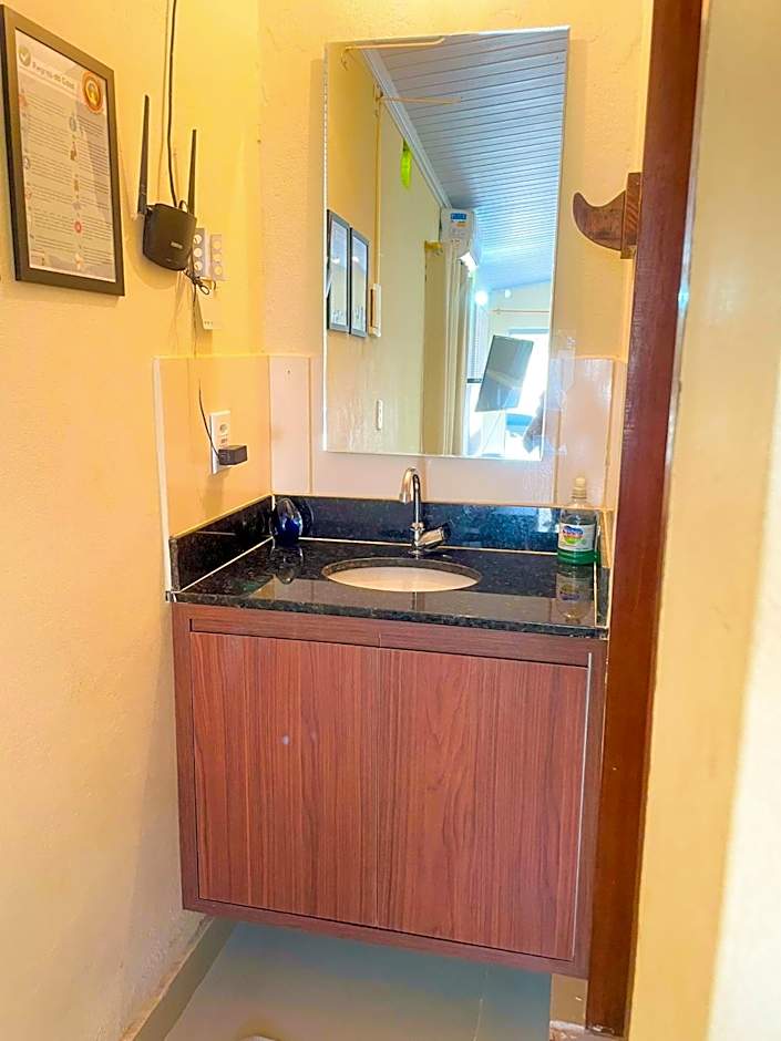 Chalé com ar condicionado e garagem