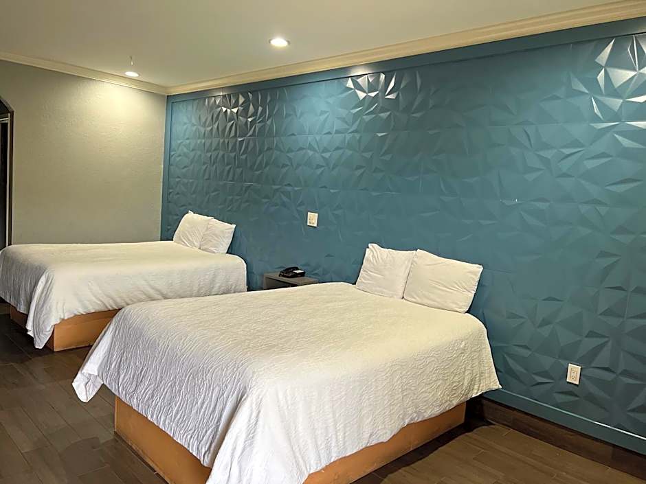 The Symphony Inn & Suites