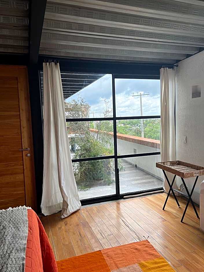 Departamento en planta baja con patio, dos habitaciones con dos ba¿os completos sala y cocina integral Vistas desde la azotea de