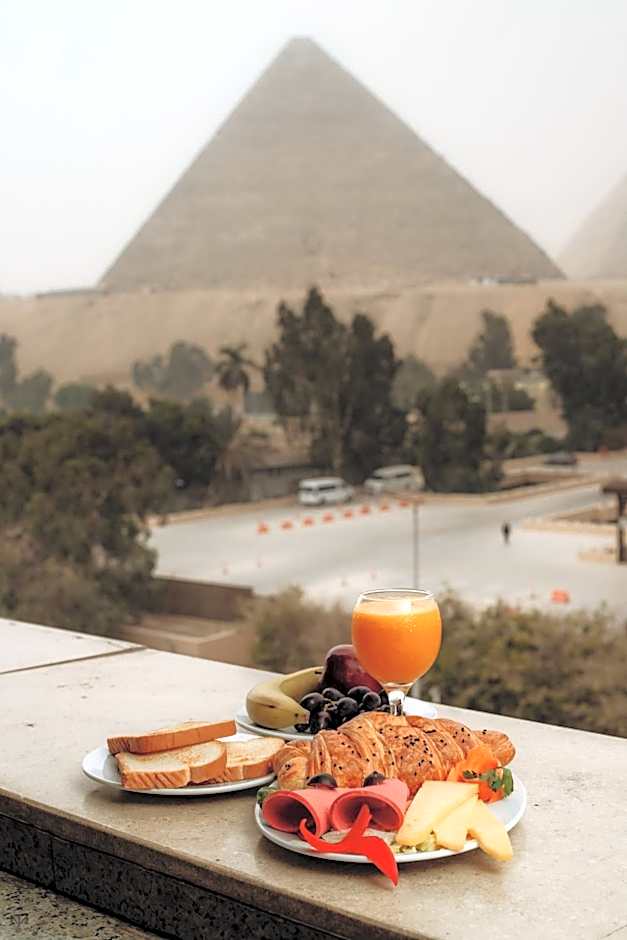 Turquoise Pyramids & Grand Egyptian museum view Hotel