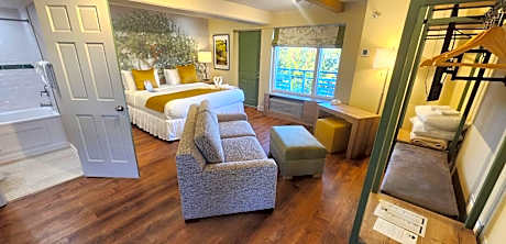 Deluxe River View Private Balcony King Four Poster Bed, Twin Sofa Bed and Jet Tub