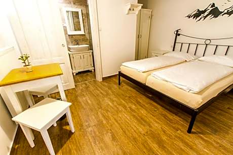 Room with Queen Size Bed and Private Bathroom