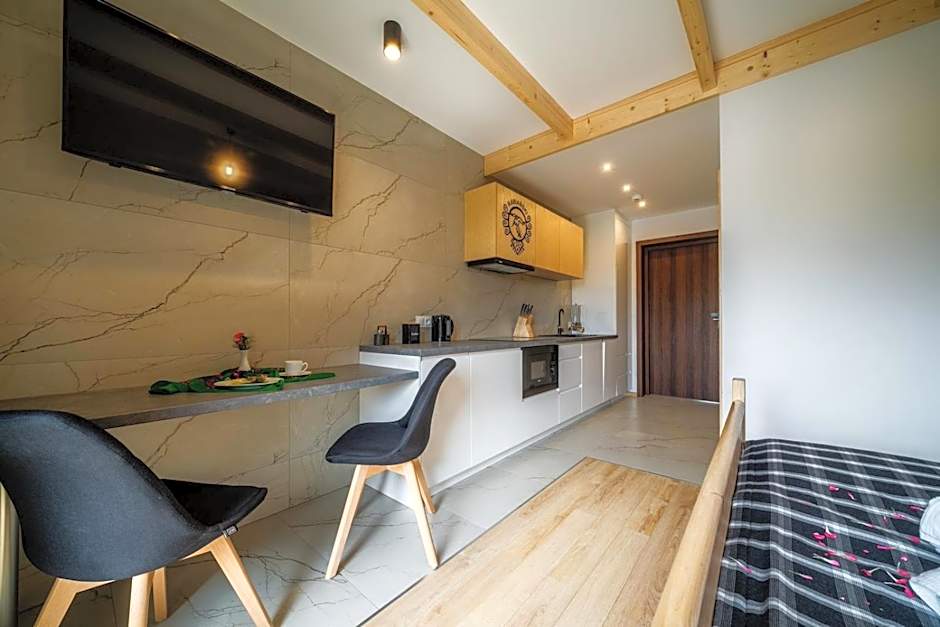 Aparthotel Rabiań-SKI 10metrów do wyciagu połączonego z całą Kotelnicą na miejscu wypoożyczalnia z serwisem