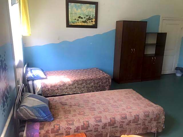 Photo 1 of 1 of Economy Triple Room with Shared Bathroom