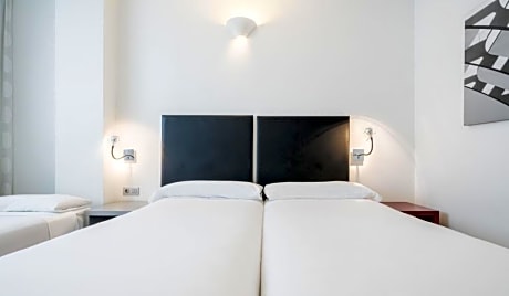 Triple Room (2 Adults + 1 Child)