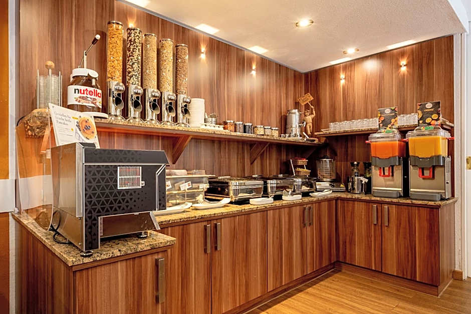 Tiptop Hotel Burgschmiet Garni