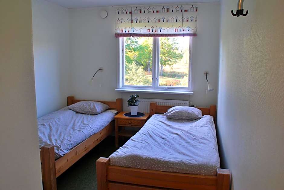 Photo 1 of 4 of Twin Room with Lake View and Shared Bathroom