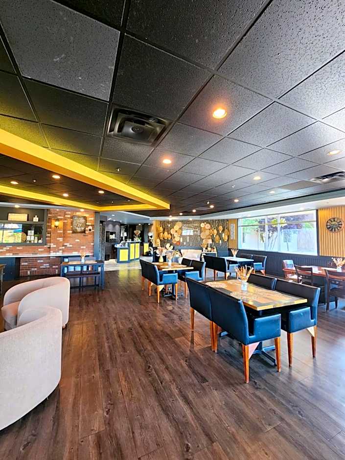 Merit Hotel & Suites