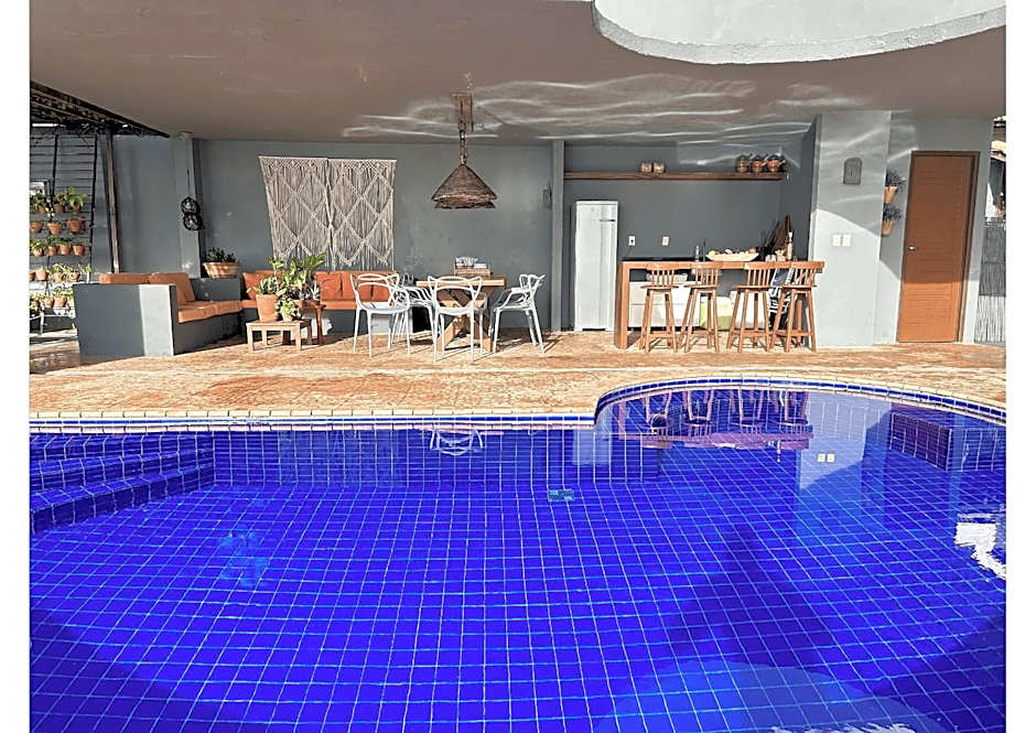 Casa Ilha| beira mar, piscina aquecida, 4 suítes