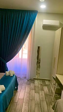 Quadruple Room with Private Bathroom