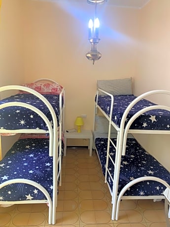 Quadruple Room with Shared Bathroom