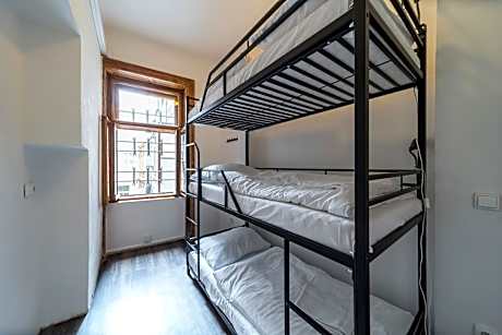 Single Bed in Dormitory Room