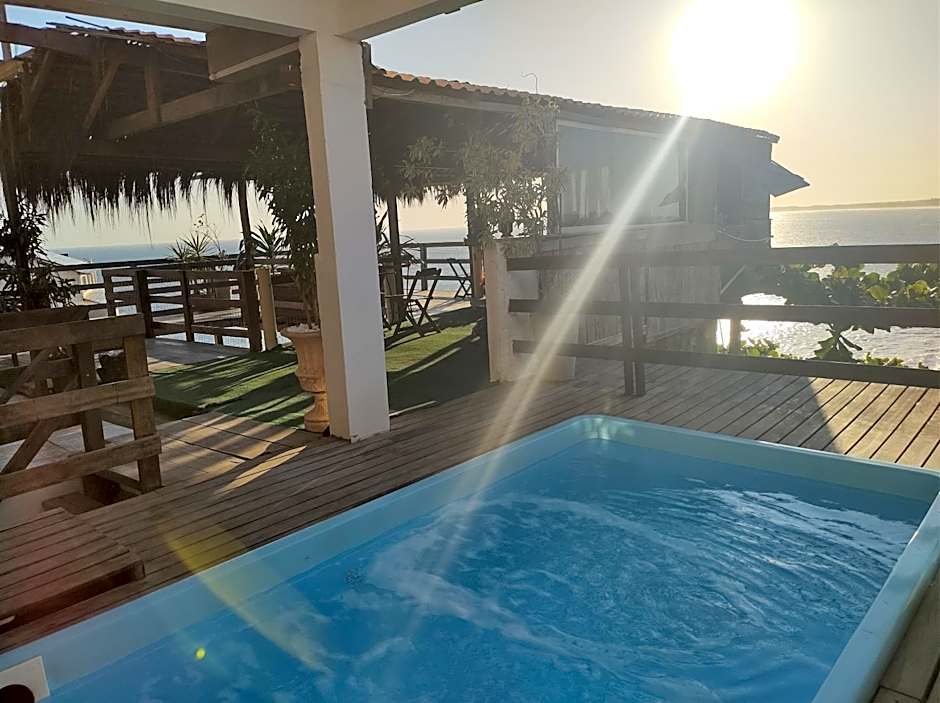 Pousada Marambaia Café - Praiana, econômica, Com café da manhã, piscina ao ar livre e hidromassagem aquecida -Frente para o mar
