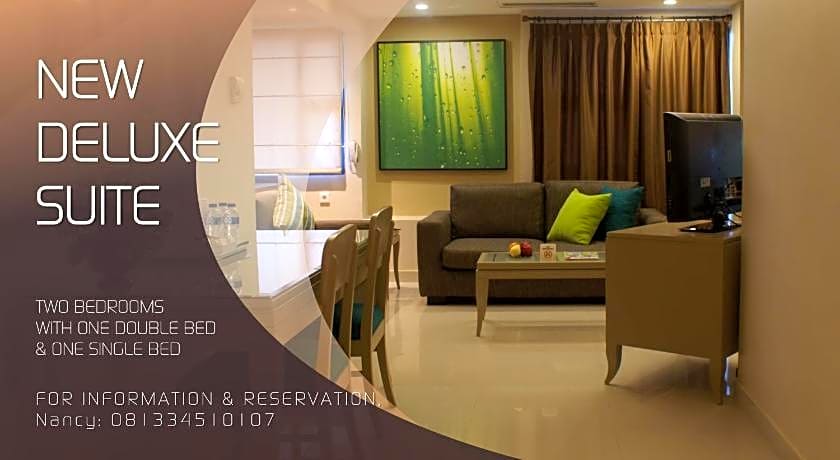 Grand Tropic Suites Hotel