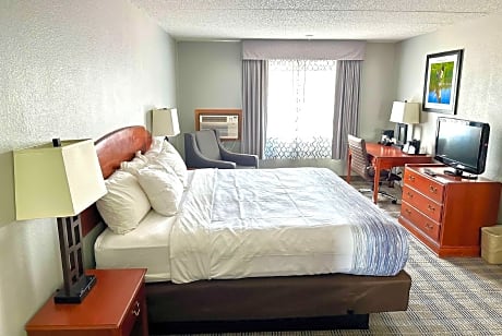 1 King Bed 1 Queen Bed 2-Bedroom Family Suite Jetted Tub Non-Smoking