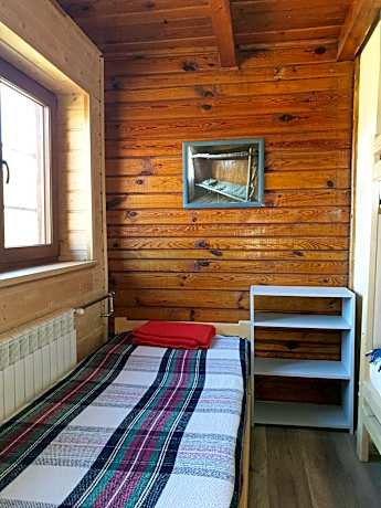 Single Bed in Dormitory Room