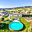 Lofts with private outdoor area and swimming-pool in Badesi