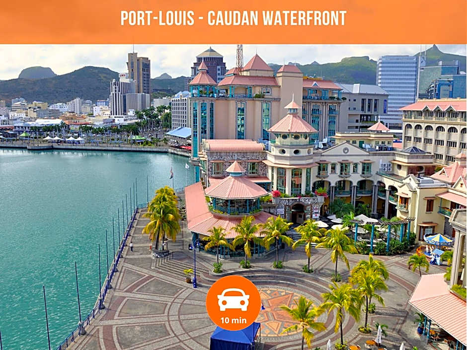 Villa Alizée - Boutique Hôtel Expérience - Idéal Couples & Pros - Piscine - Restaurant - Rooftop bar - Parking privé - 10min Port-Louis - Ambiance Tropical chic & authentique