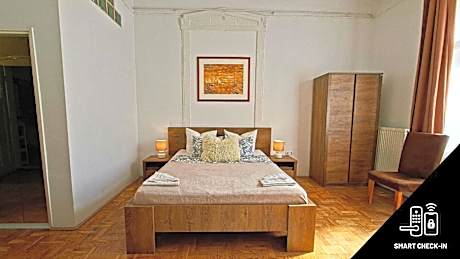Large Family Room with Balcony and Share Bathroom