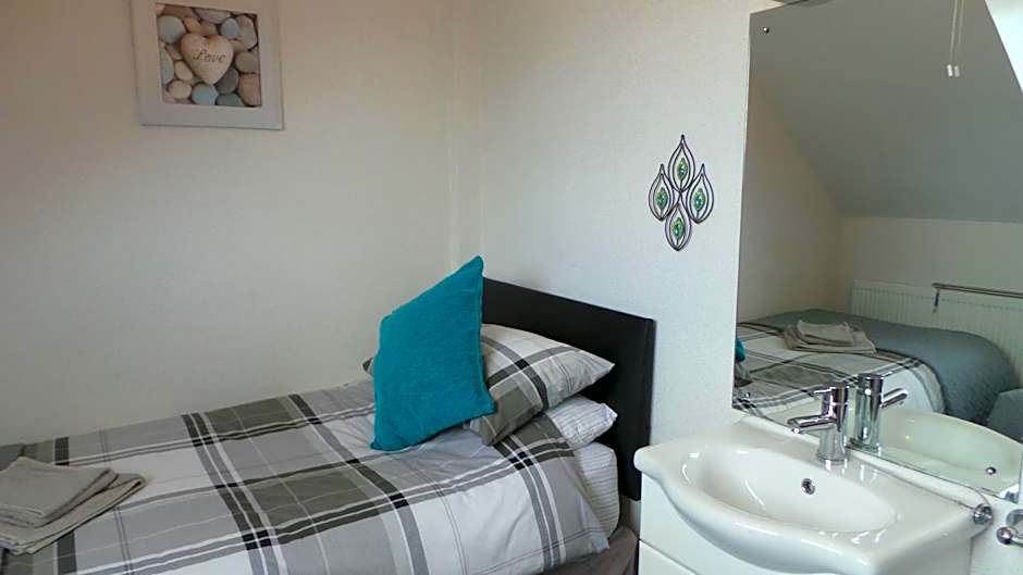 Photo 1 of 9 of Twin Room with Shared Bathroom