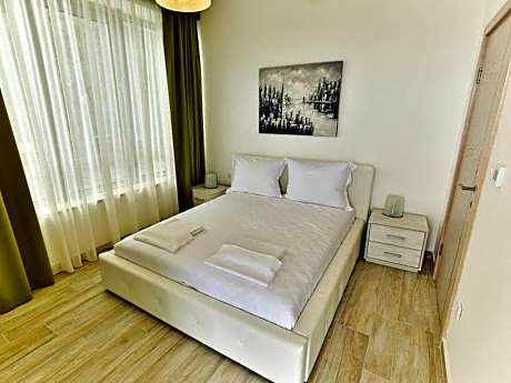 One-Bedroom Apartment with Balcony and Garden View