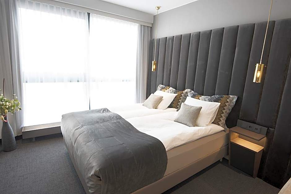 B14 Apartments & Rooms